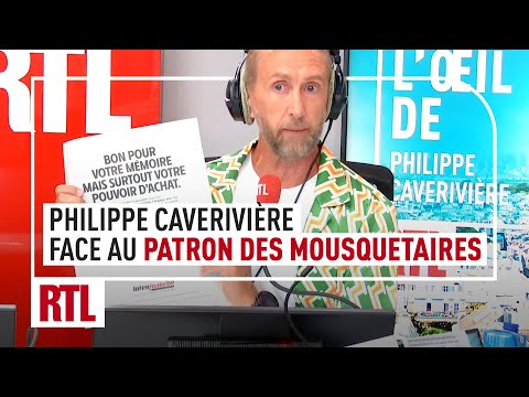 Philippe Caverivière face Thierry Cotillard, président du Groupement Les Mousquetaires
